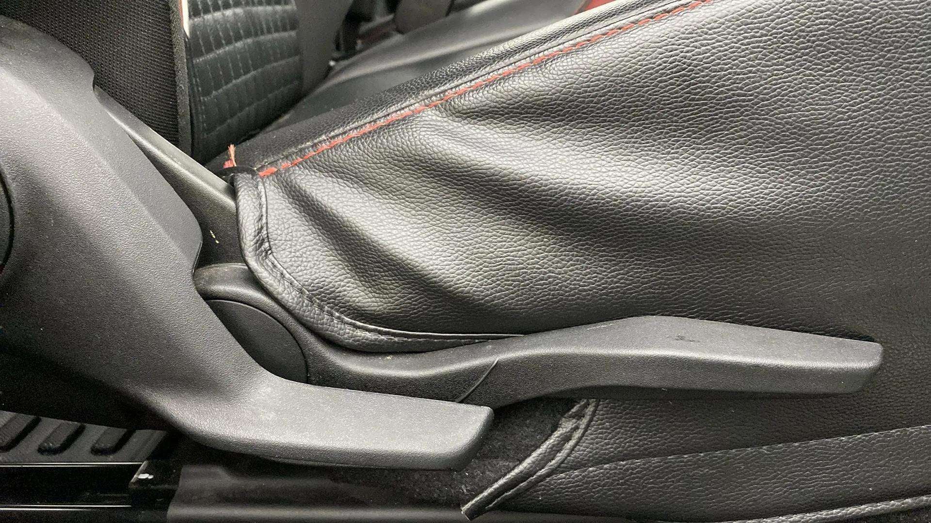 Handbrake lever close-up of a Maruti Suzuki Swift