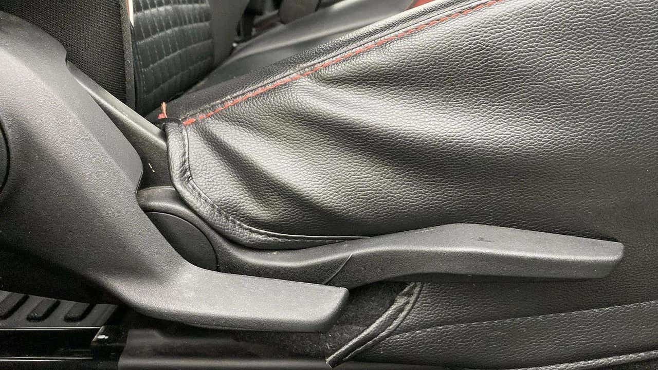 Handbrake lever close-up of a Maruti Suzuki Swift