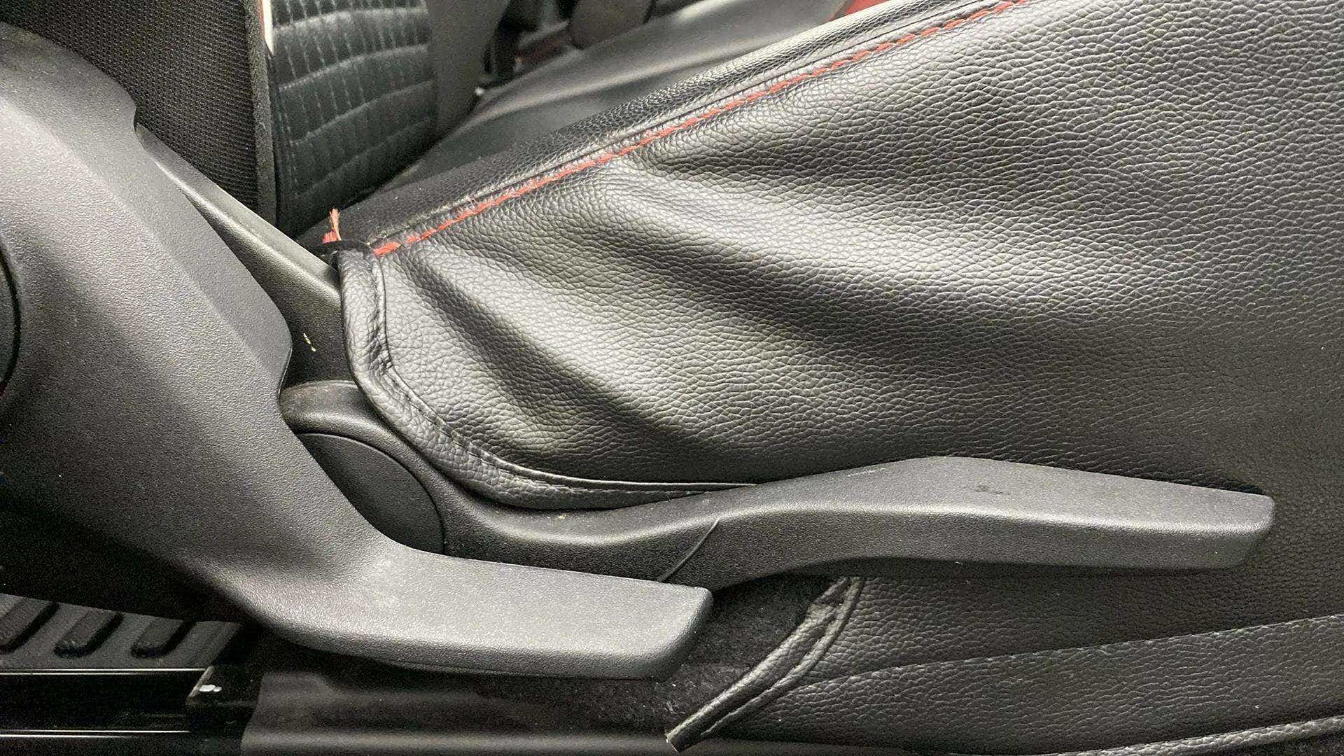 Handbrake lever close-up of a Maruti Suzuki Swift