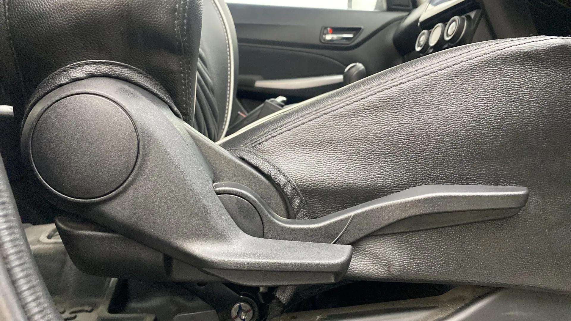 Side seat adjustment lever view of a Maruti Suzuki Swift 2021 - 2023