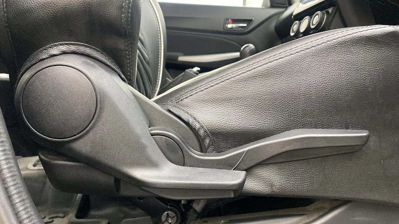 Side seat adjustment lever view of a Maruti Suzuki Swift 2021 - 2023
