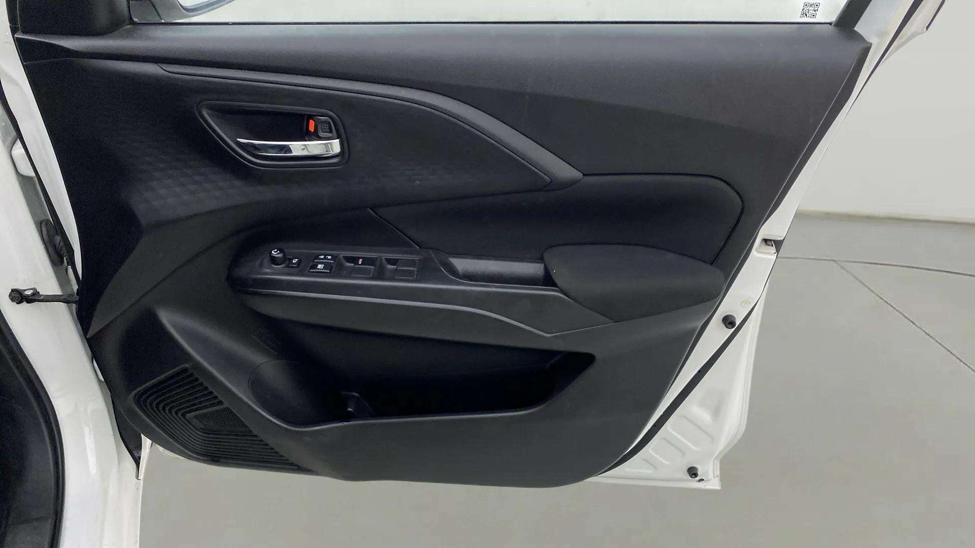 Interior driver side door panel of a Maruti Suzuki Swift