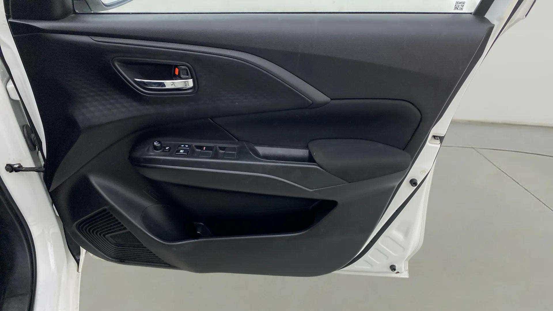 Interior driver side door panel of a Maruti Suzuki Swift