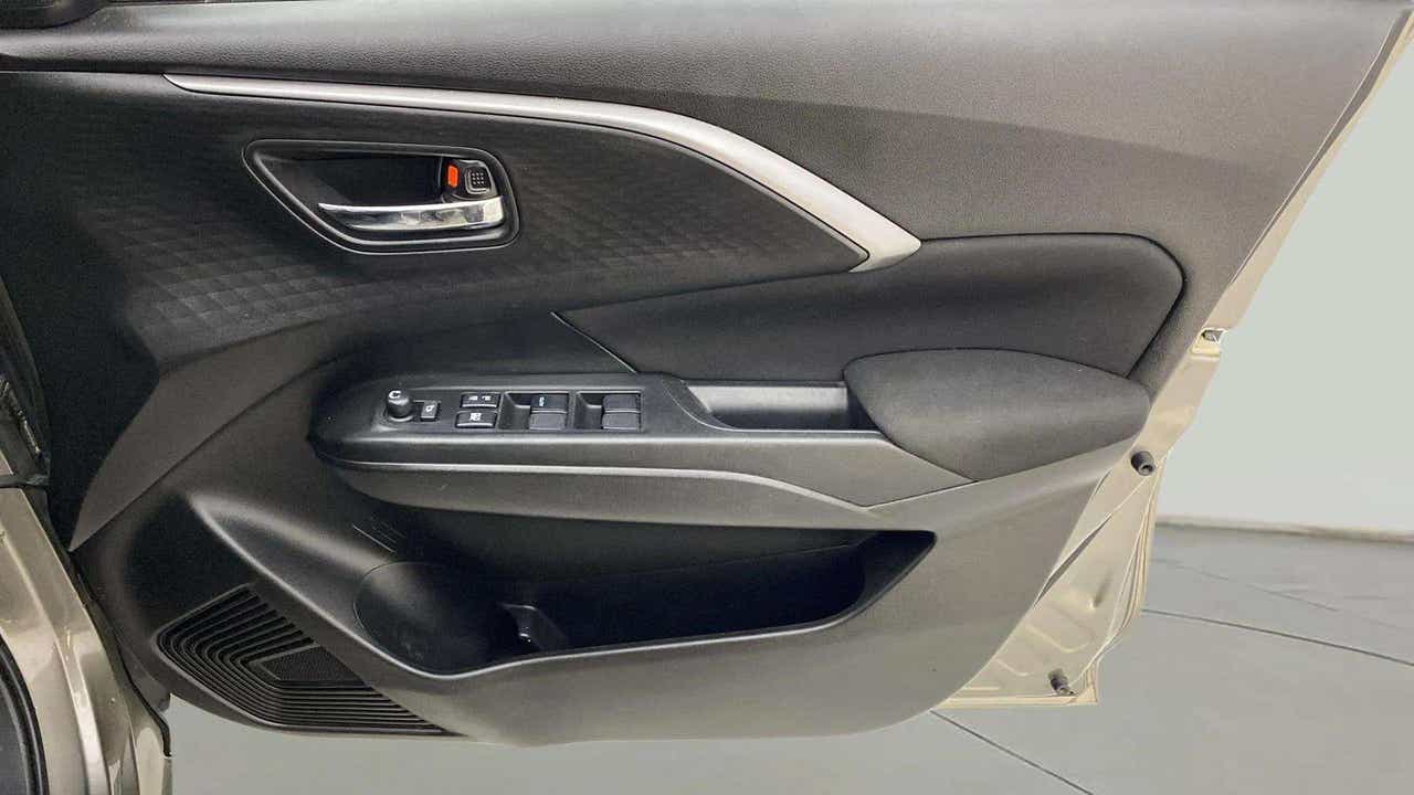 Interior door panel of a Maruti Suzuki Swift