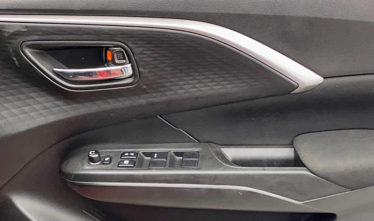 Interior door panel of a Maruti Suzuki Swift