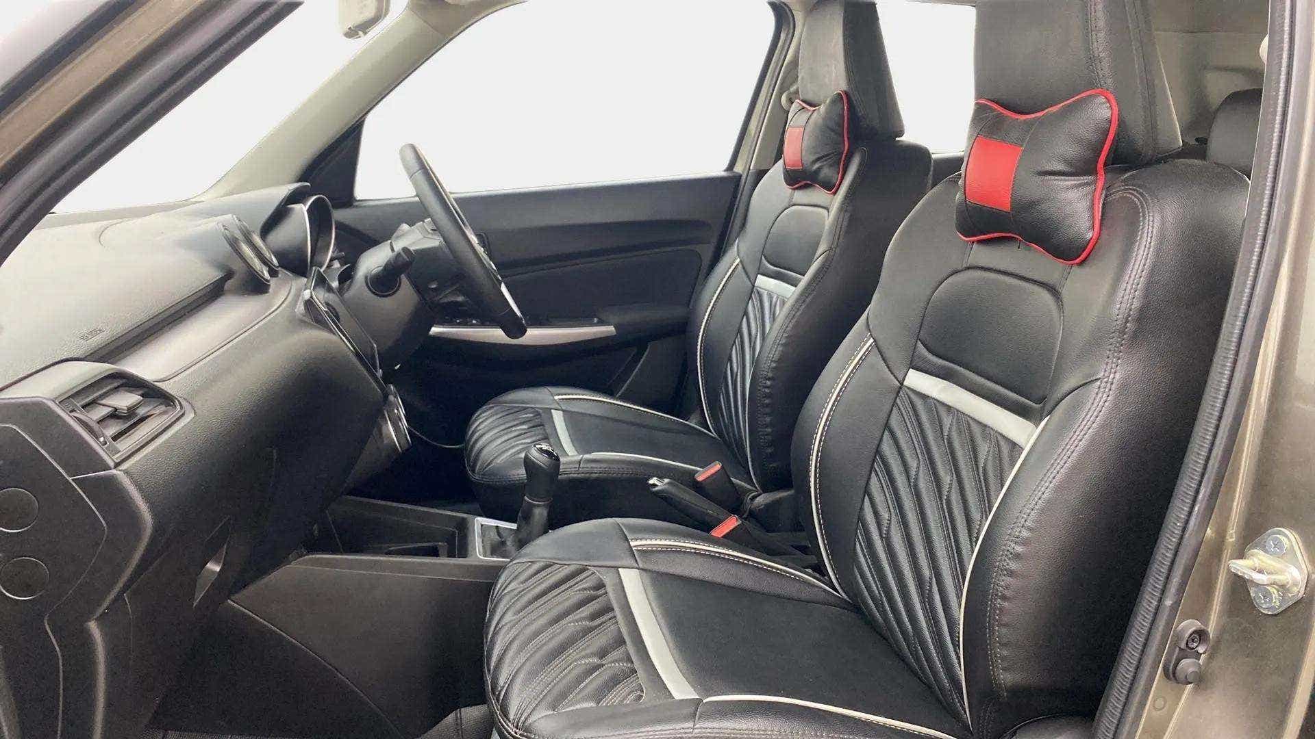 Front interior cabin of a Maruti Suzuki Swift 2021 - 2023