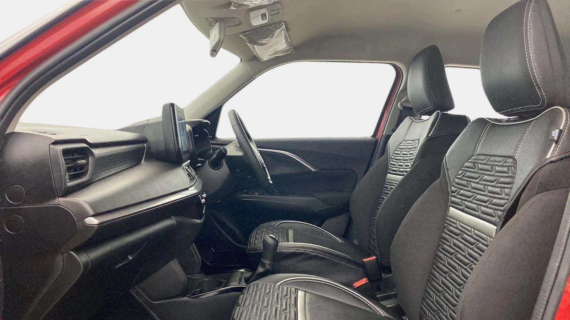 Front interior view of a Maruti Suzuki Swift