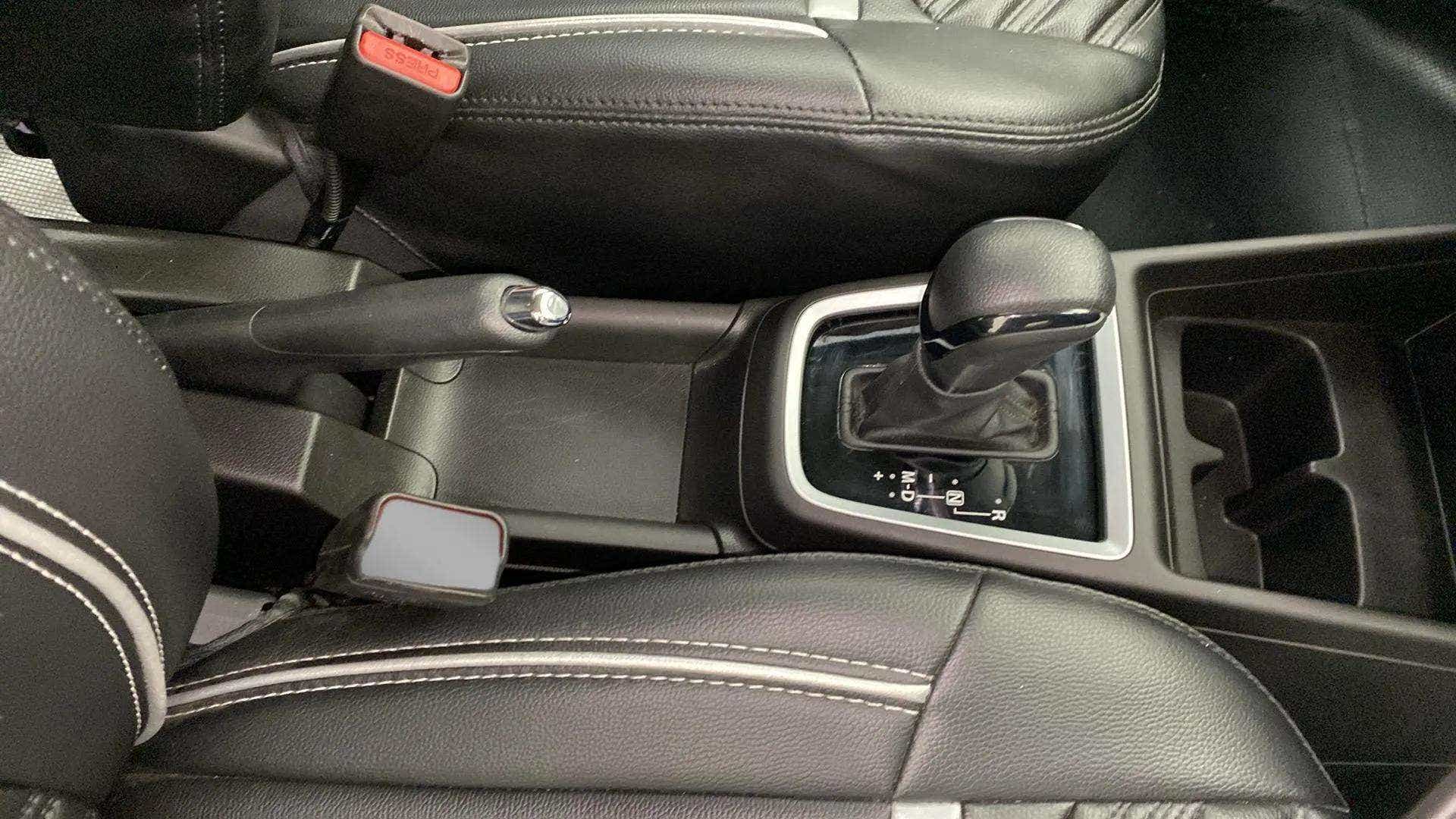 Centre console and gear lever of a Maruti Suzuki Swift