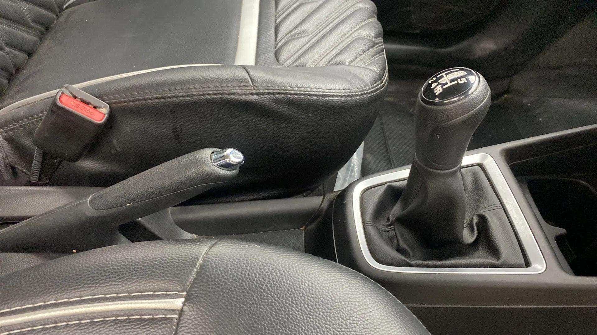 Gear shifter and handbrake area of a Maruti Suzuki Swift 2021 - 2023