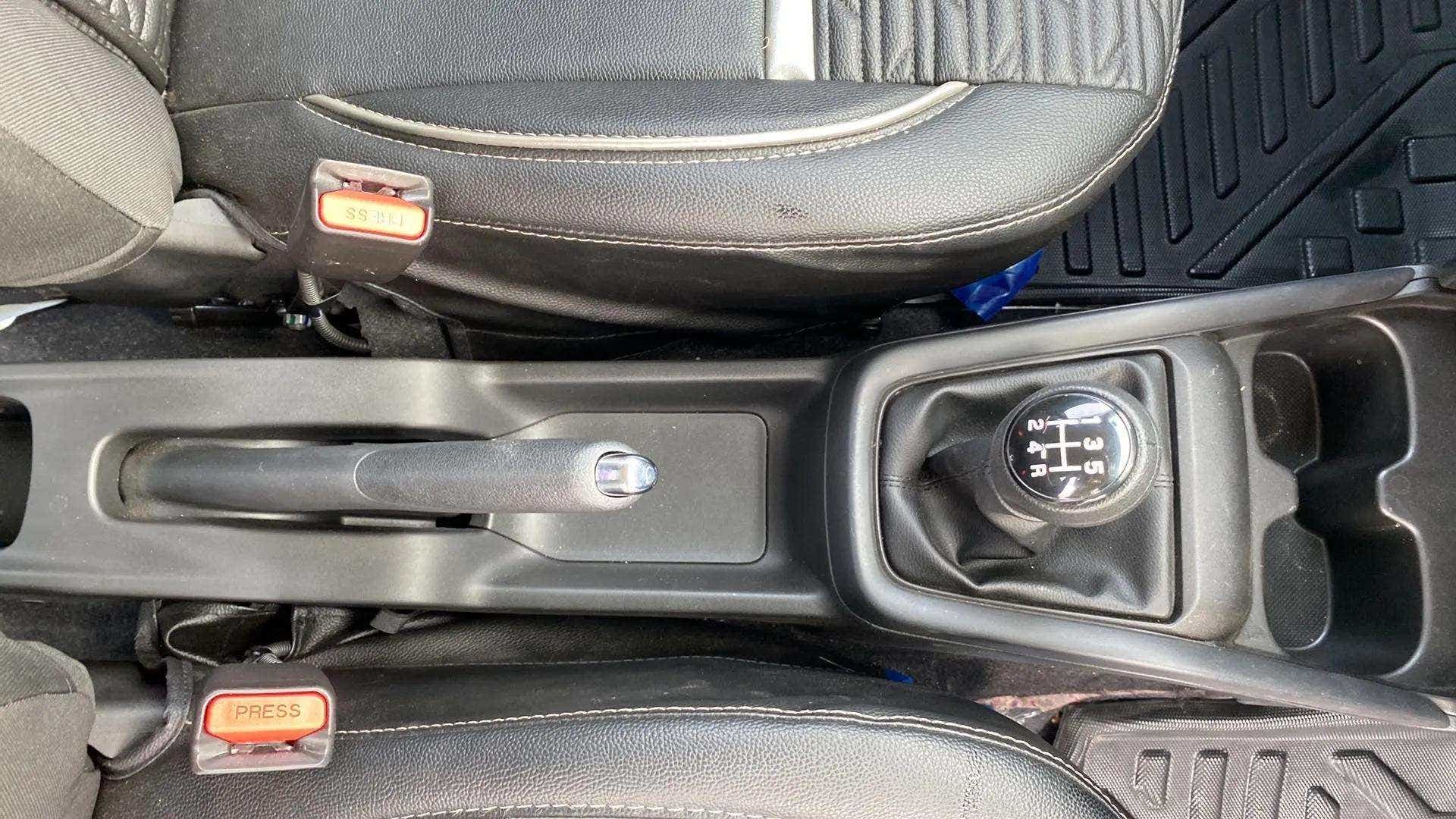 Gear shift and center console of a Maruti Suzuki Swift
