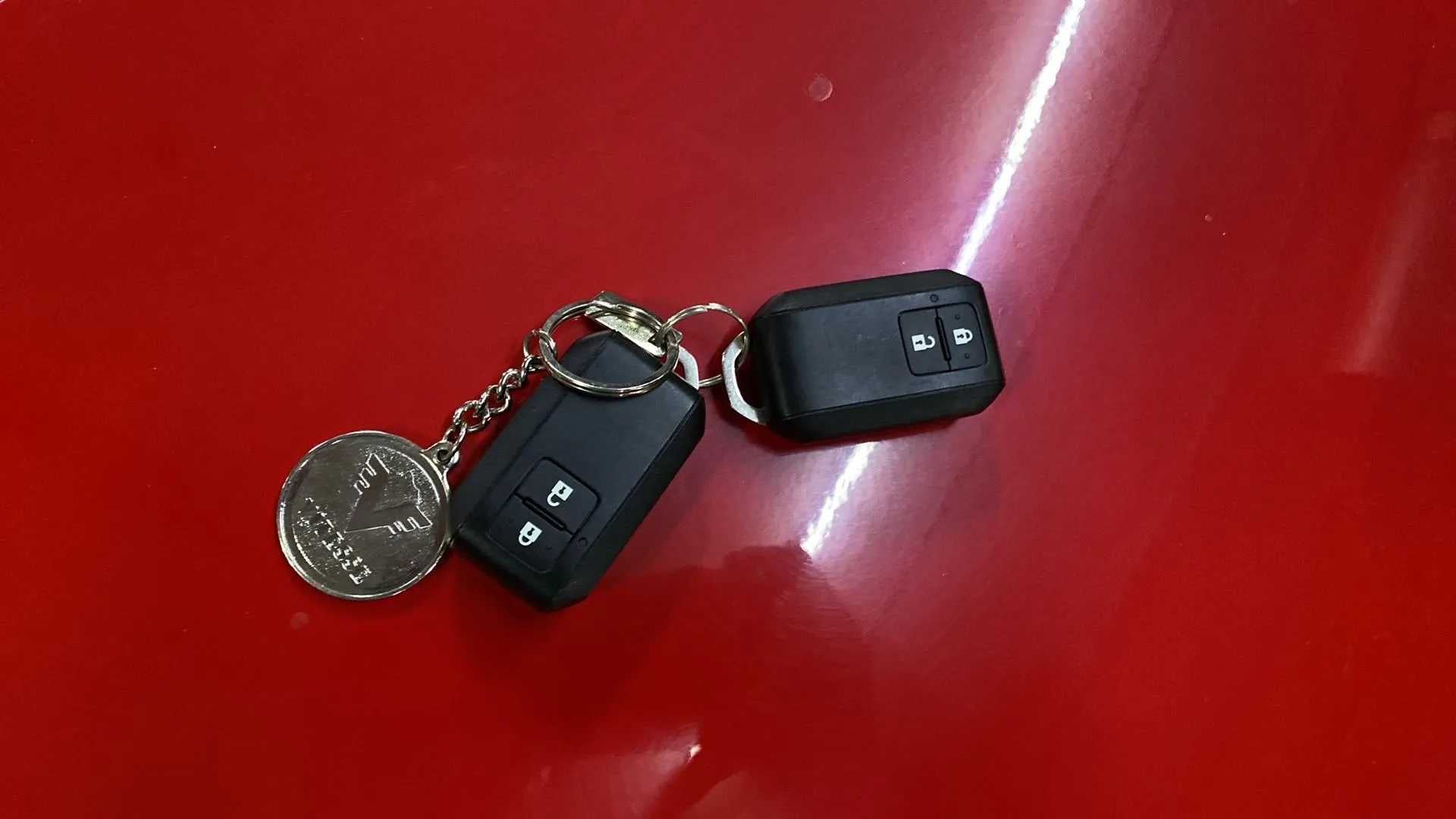 Car keys on the bonnet of a maruti suzuki swift 2021 - 2023