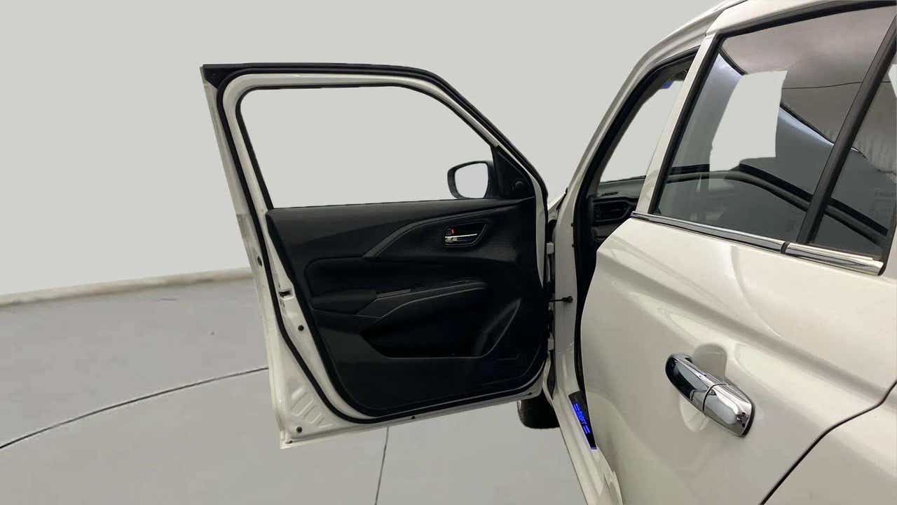 Front driver-side door view of a Maruti Suzuki Swift