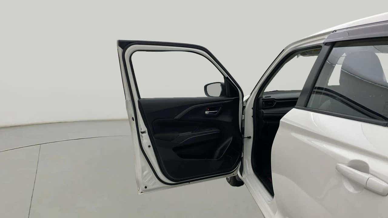 Front driver side door view of a Maruti Suzuki Swift