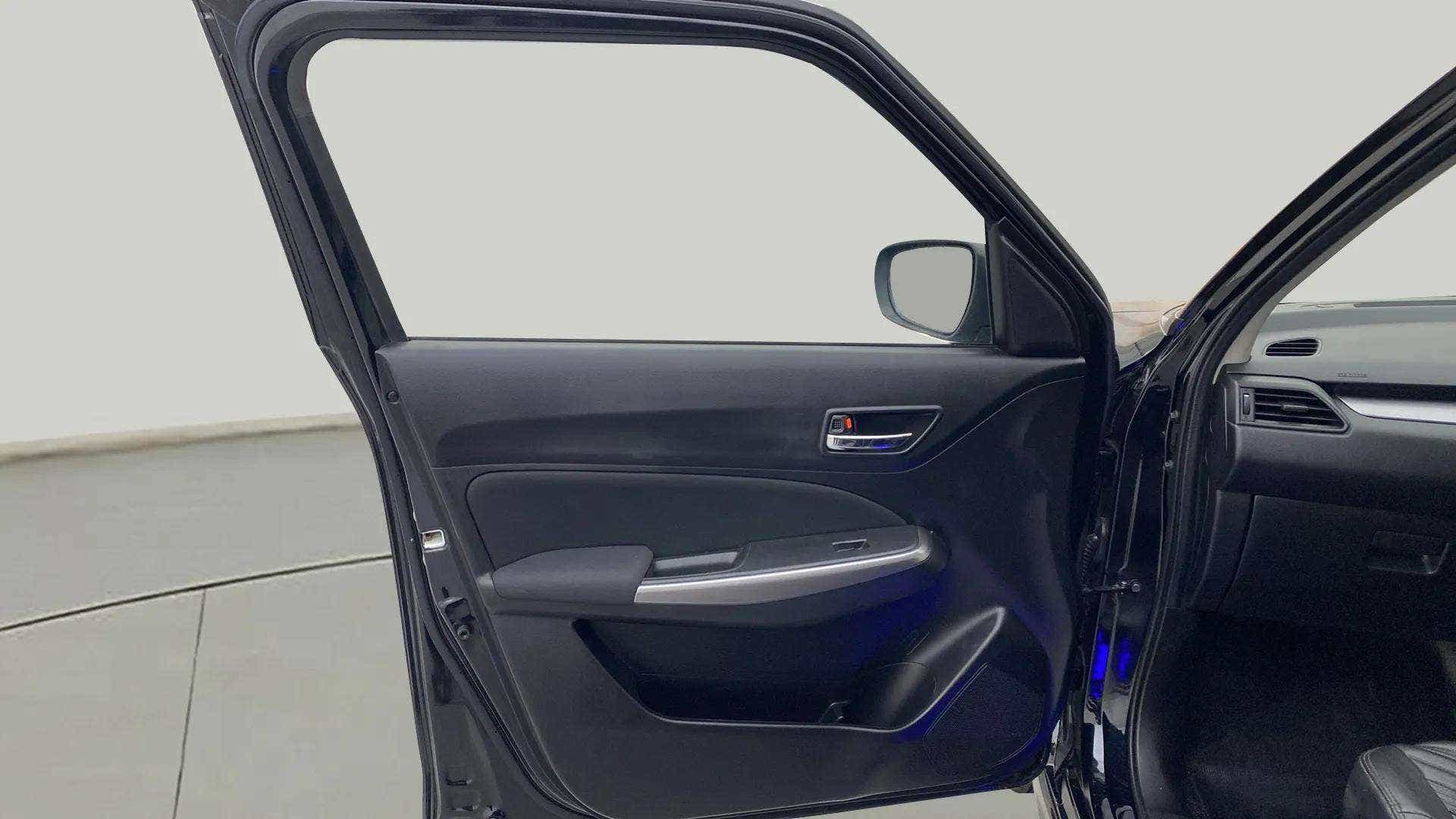 Front door interior of a Maruti Suzuki Swift