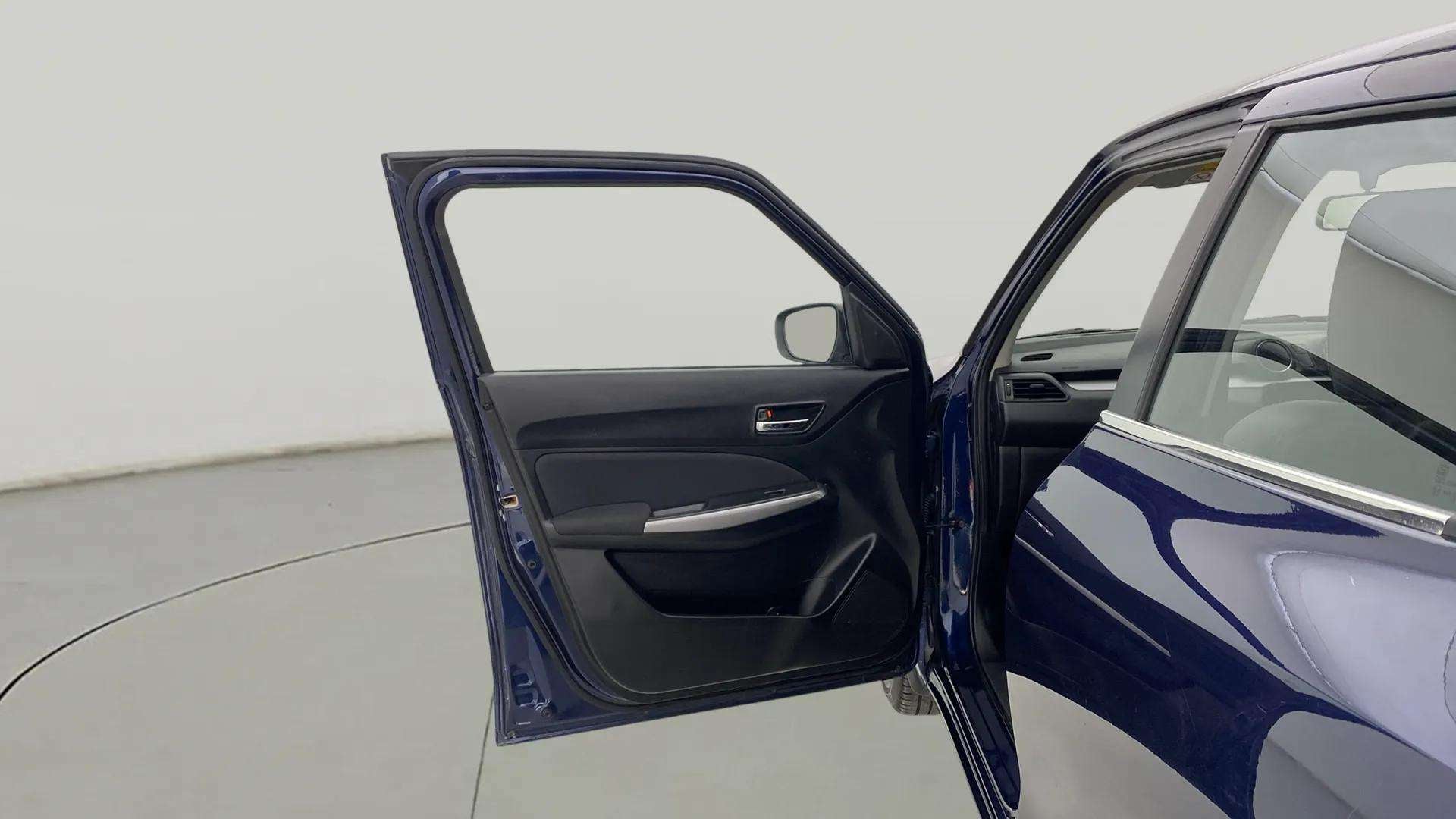 Driver side door view of a Maruti Suzuki Swift