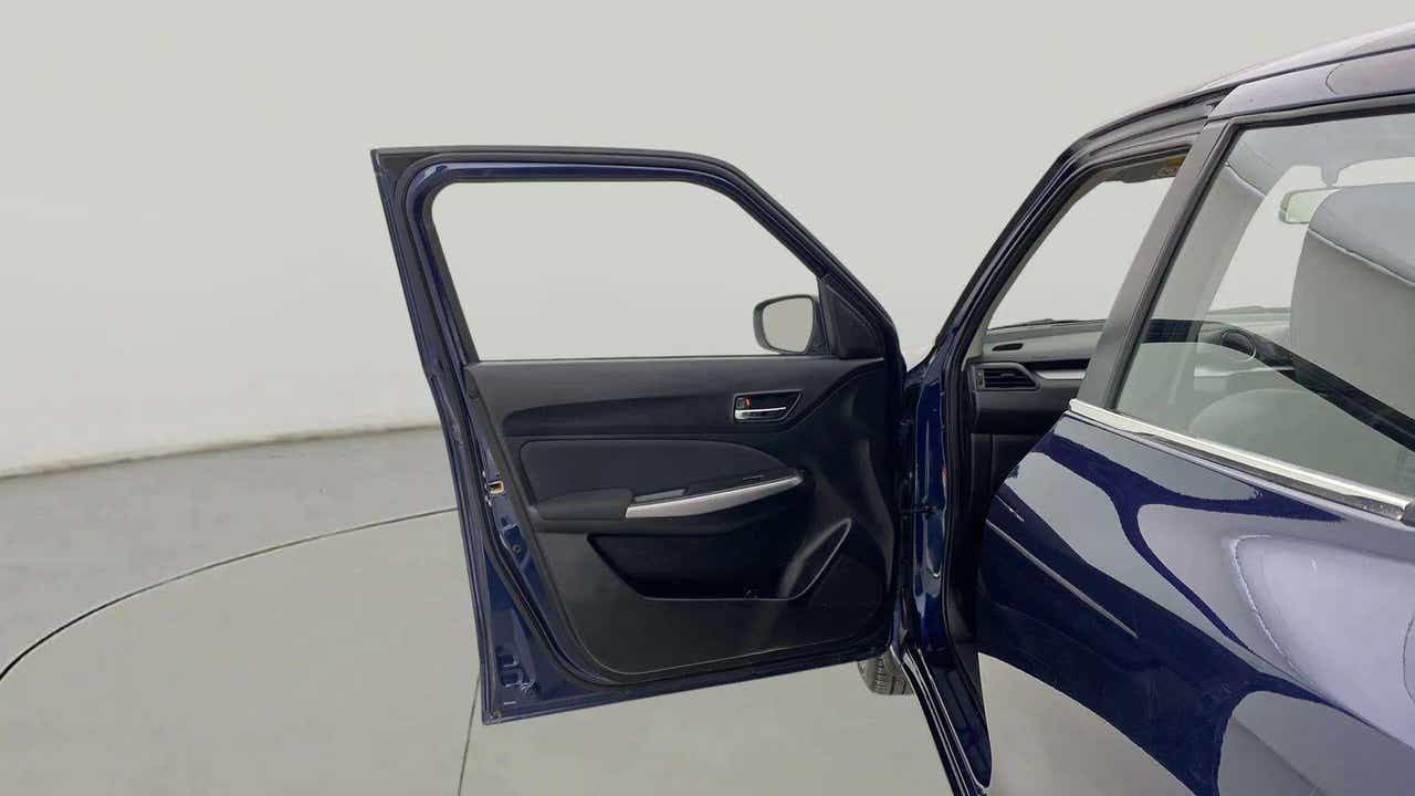 Driver side door view of a Maruti Suzuki Swift