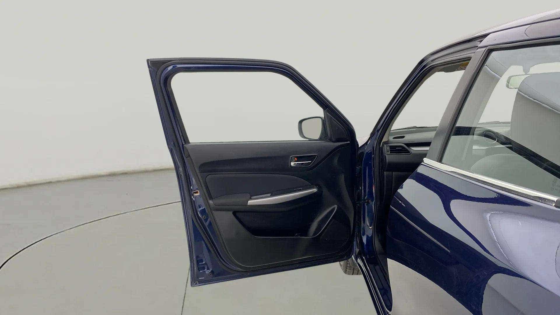 Driver side door view of a Maruti Suzuki Swift