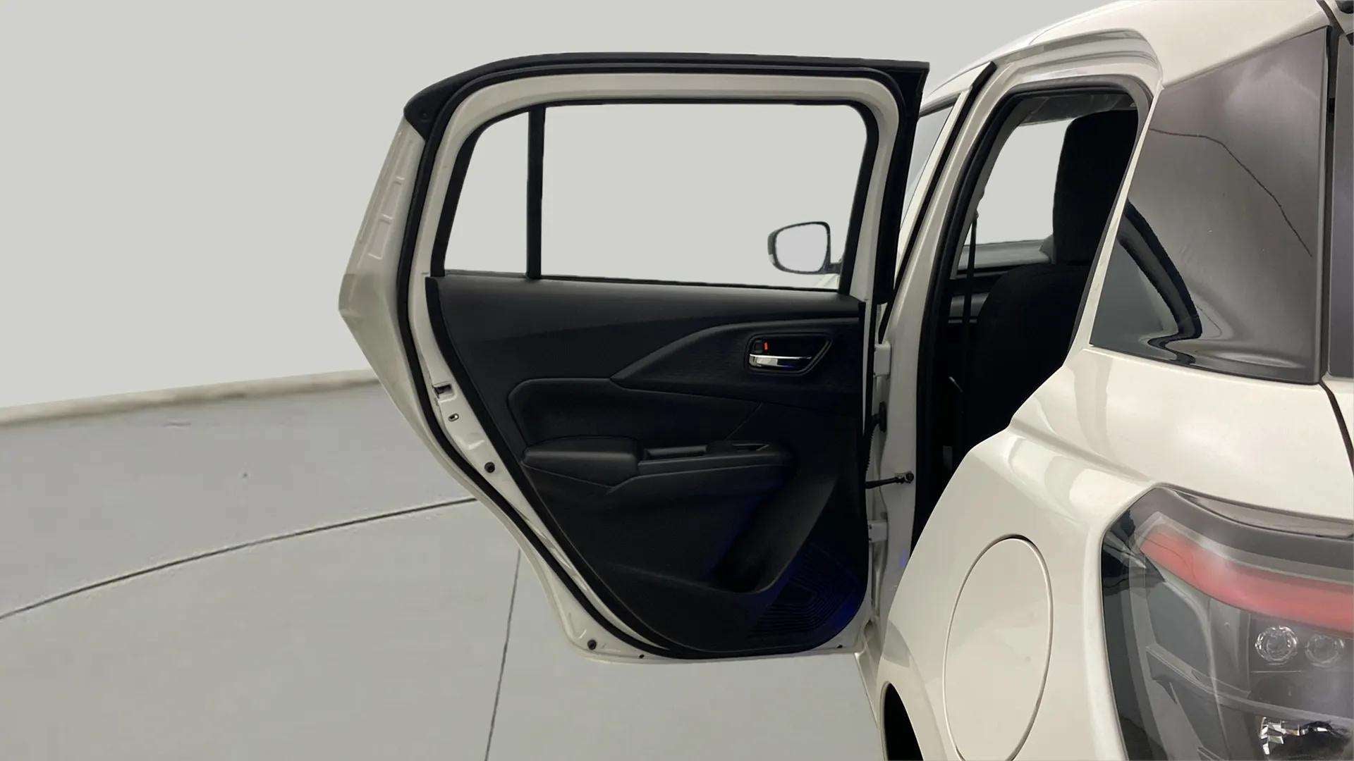 Rear door and quarter panel view of a Maruti Suzuki Swift
