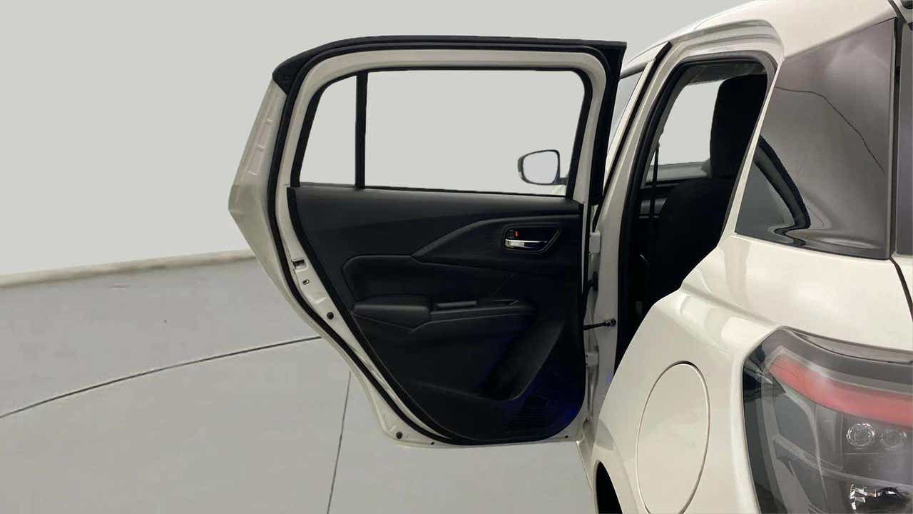 Rear door and quarter panel view of a Maruti Suzuki Swift