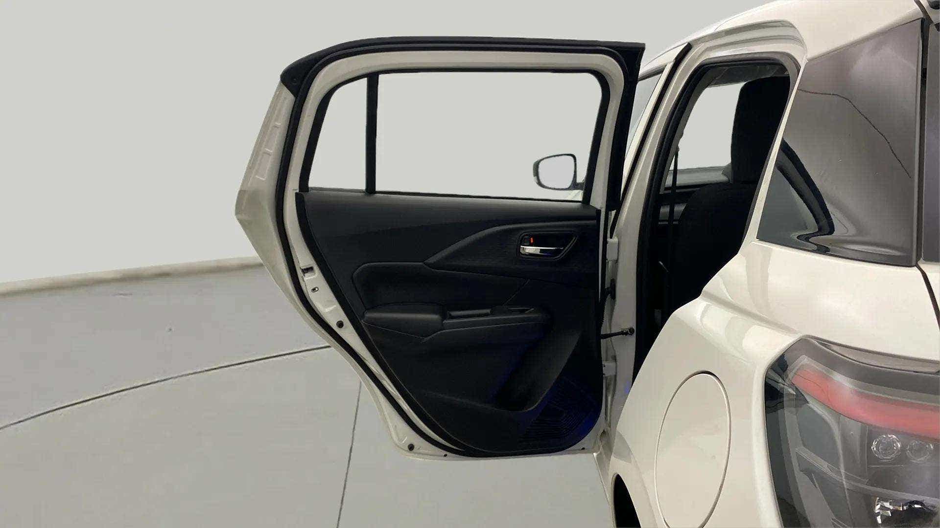 Rear door and quarter panel view of a Maruti Suzuki Swift