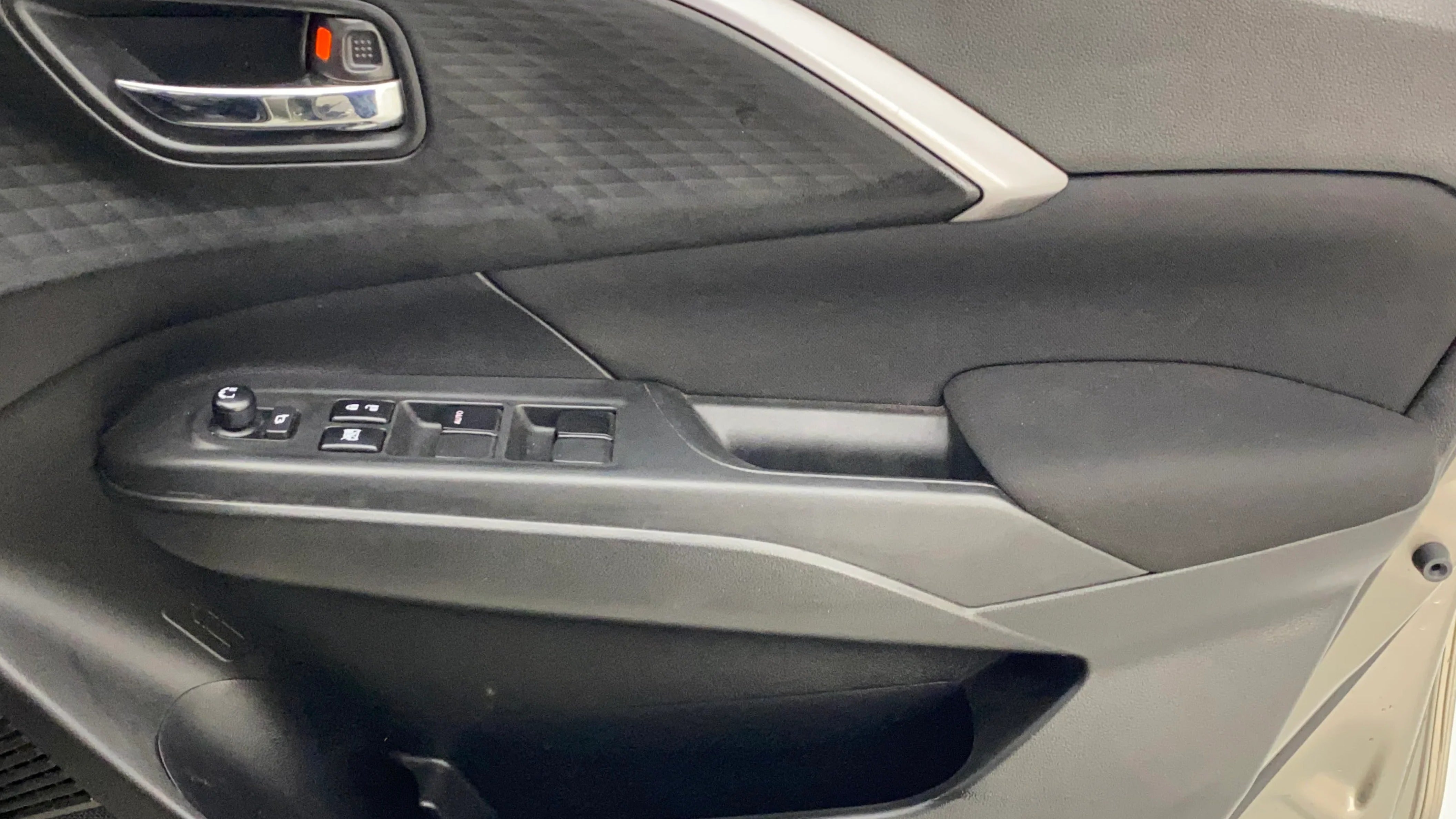 Front door panel of a Maruti Suzuki Swift