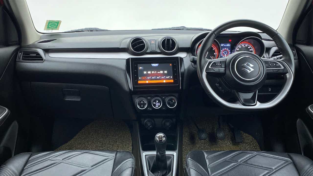 Dashboard and steering view of a Maruti Suzuki Swift 2021 - 2023