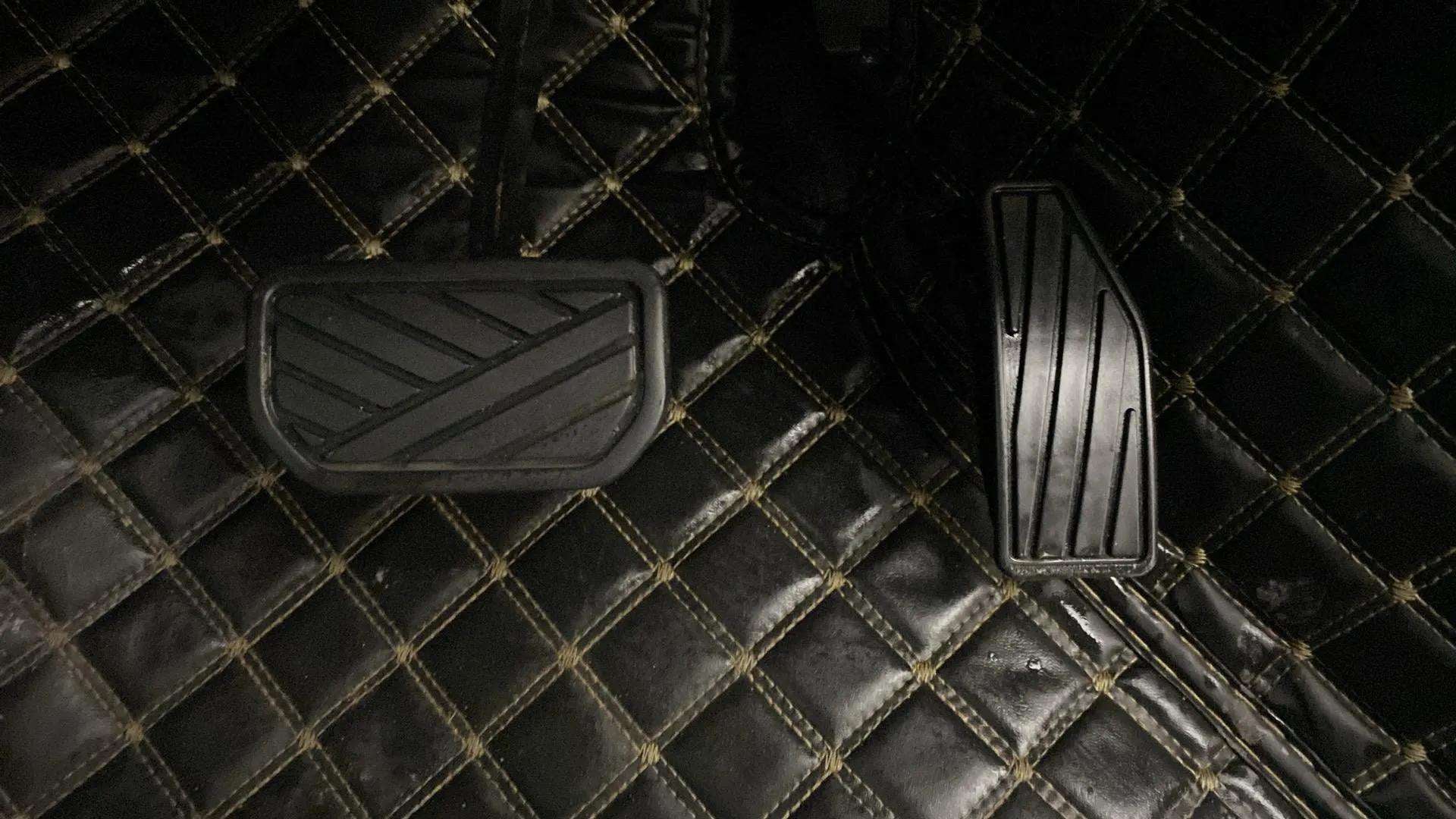 Foot pedals view of a Maruti Suzuki Swift