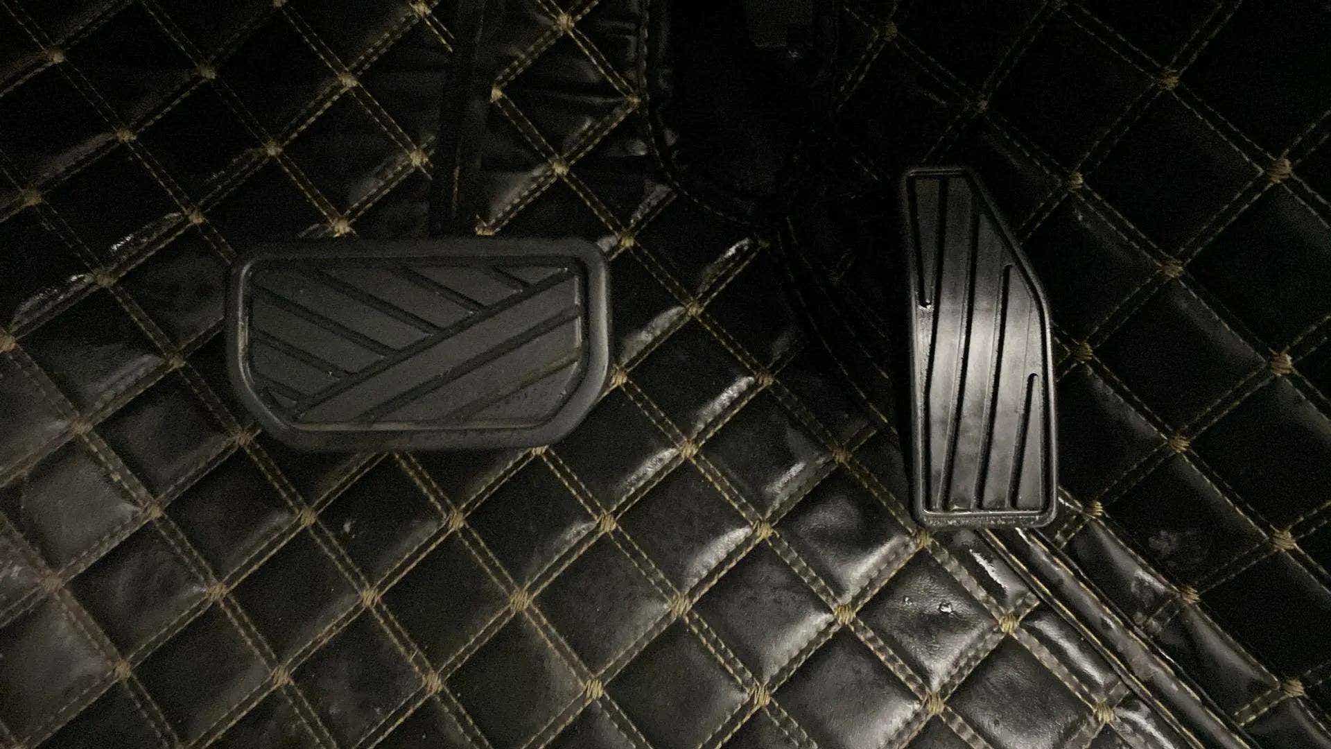 Foot pedals view of a Maruti Suzuki Swift