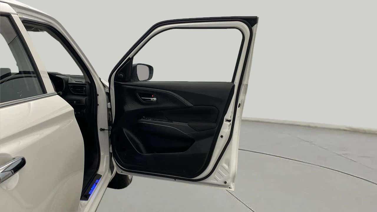 Front door and interior trim of a Maruti Suzuki Swift