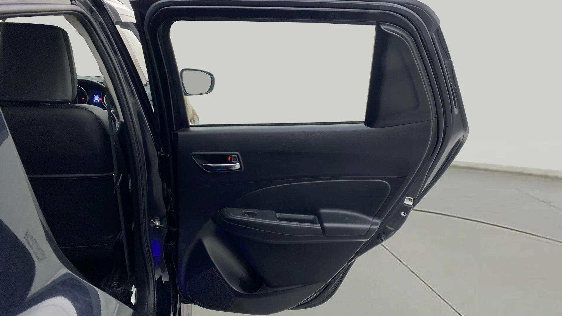 Rear door interior of a Maruti Suzuki Swift