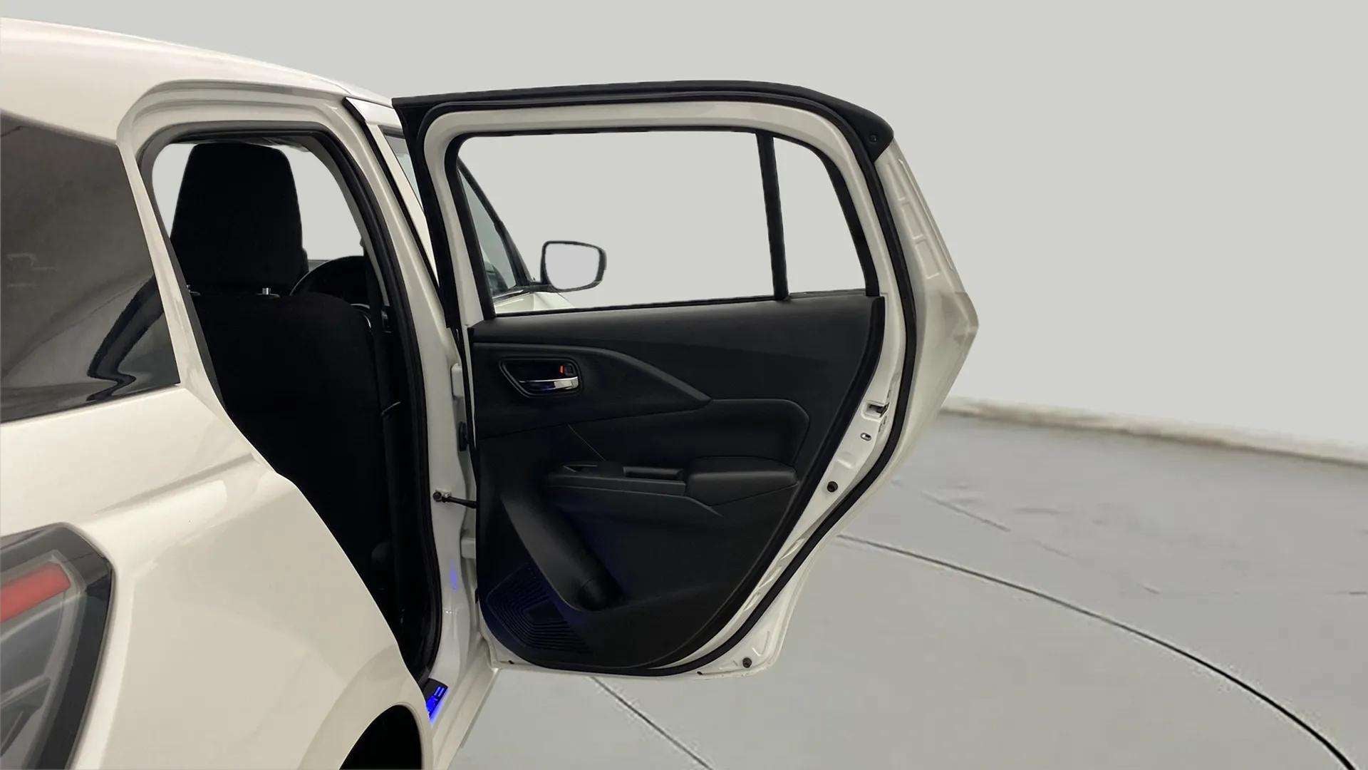 Rear door open view of a Maruti Suzuki Swift