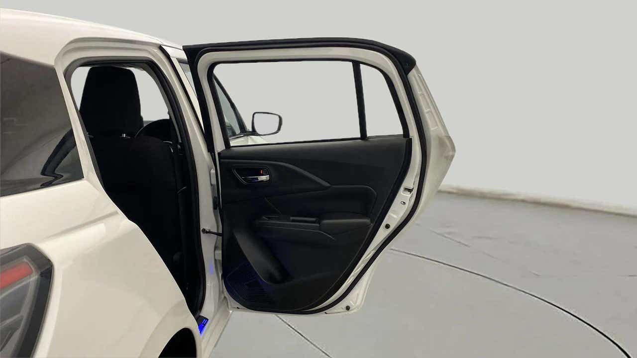 Rear door open view of a Maruti Suzuki Swift