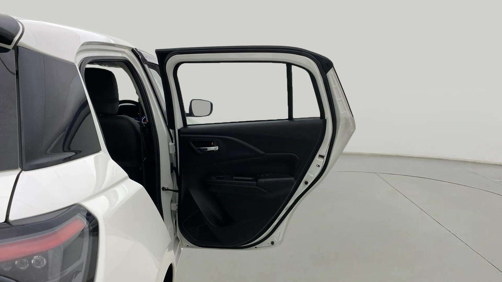 Open left rear door view of a Maruti Suzuki Swift