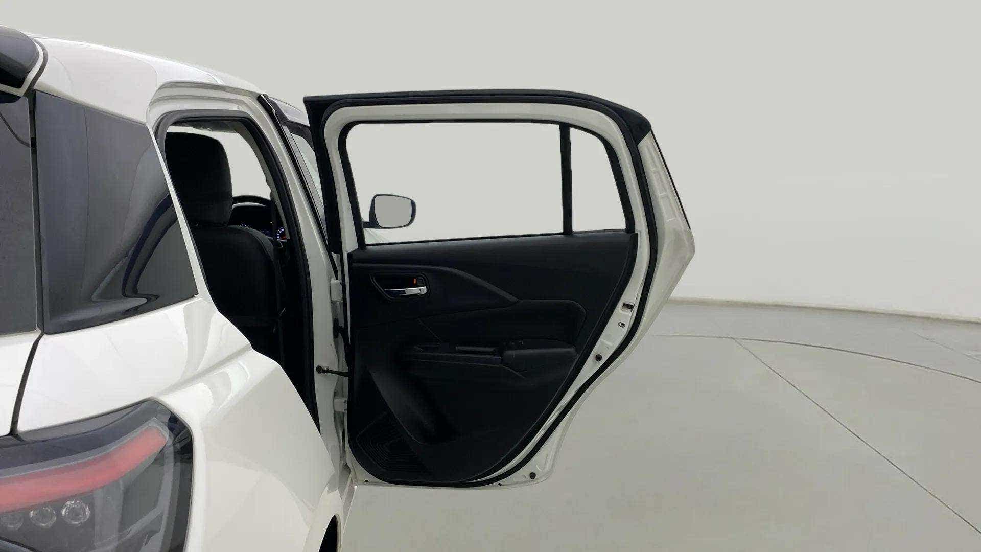 Open left rear door view of a Maruti Suzuki Swift