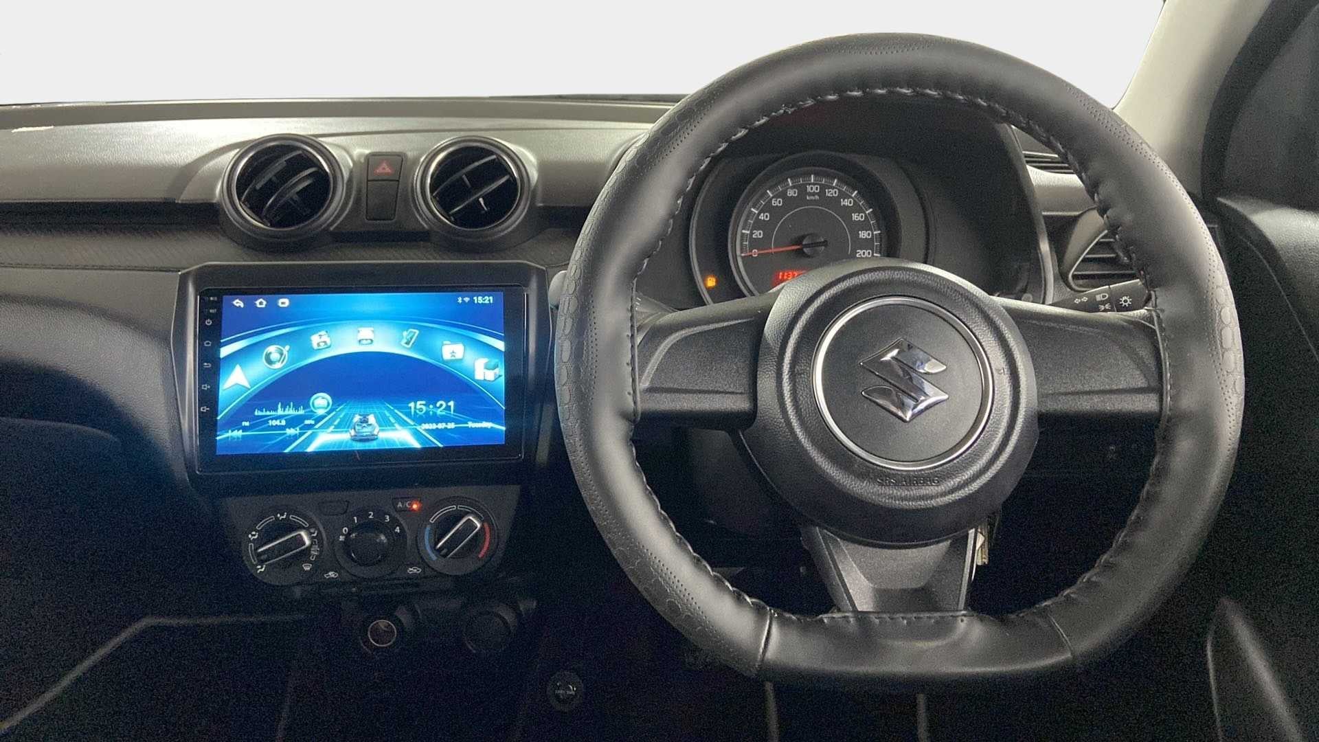 Dashboard and steering wheel of a Maruti Suzuki Swift 2021 - 2023