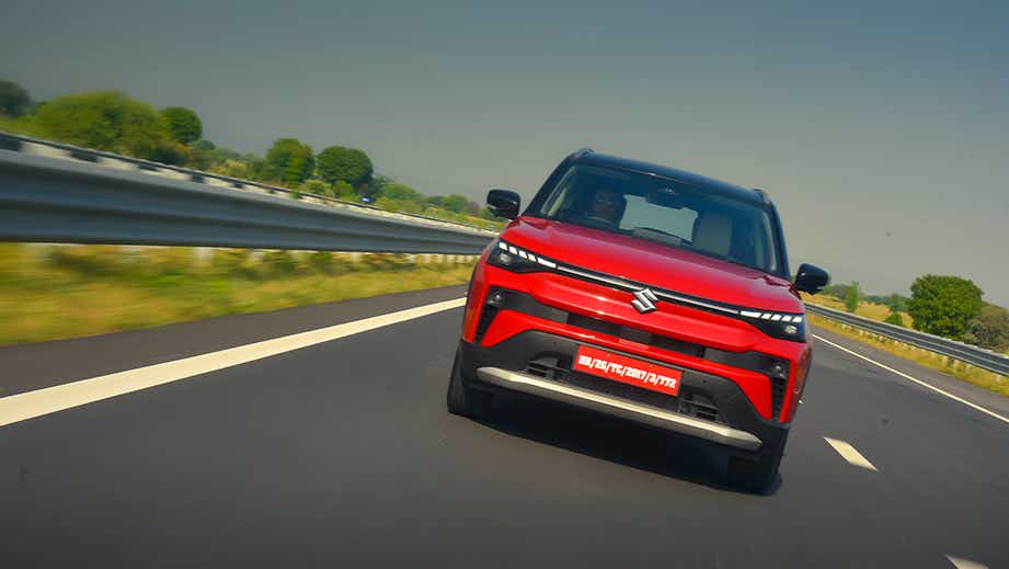 Front view of a sizzling red Maruti Suzuki Victoris