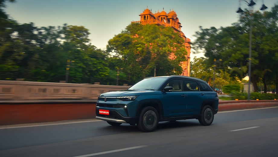 Side view of a Eternal Blue Maruti Suzuki Victoris