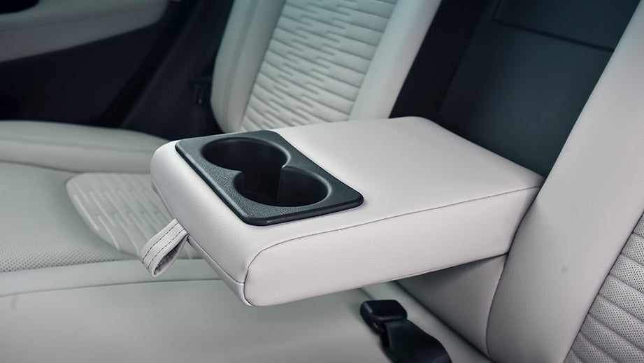 Rear seat center armrest with cup holders