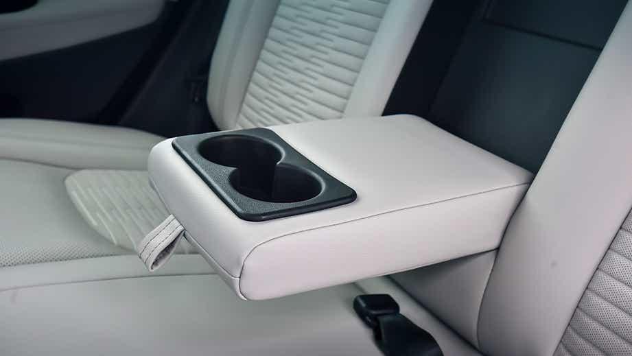 Rear seat center armrest with cup holders