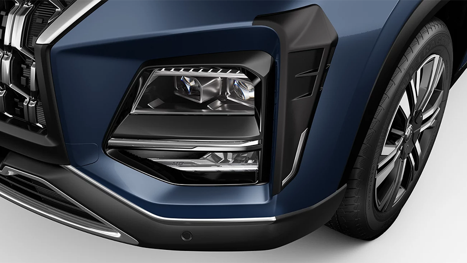 Headlight close-up of a Cleadon Blue MG Hector Facelift