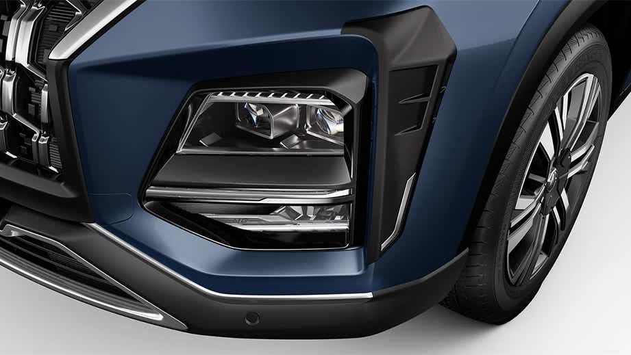 Headlight close-up of a Cleadon Blue MG Hector Facelift