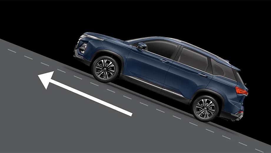 Side view of a cleadon blue MG Hector Facelift on a slope