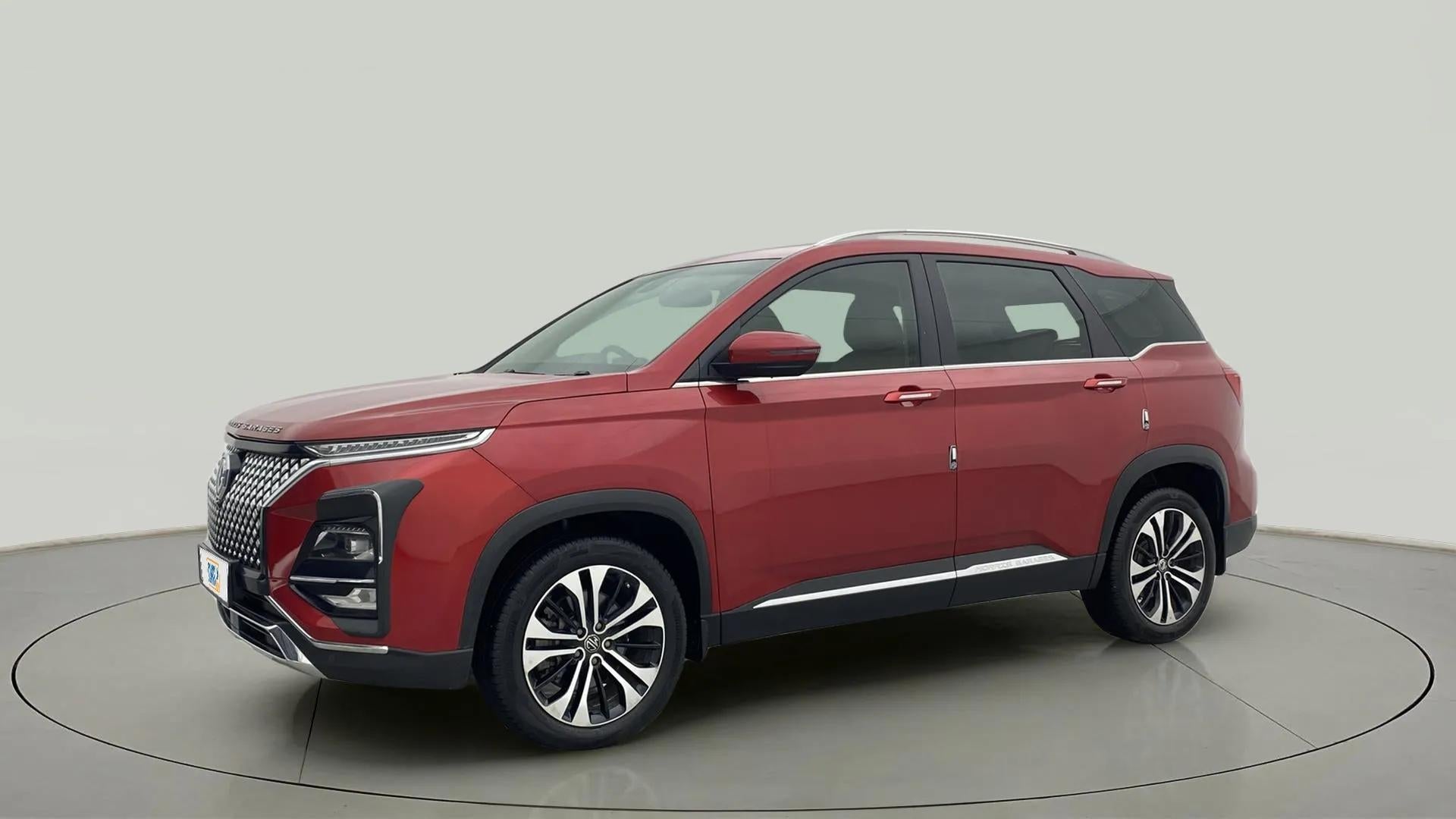 Front and side view of a glaze red MG Hector