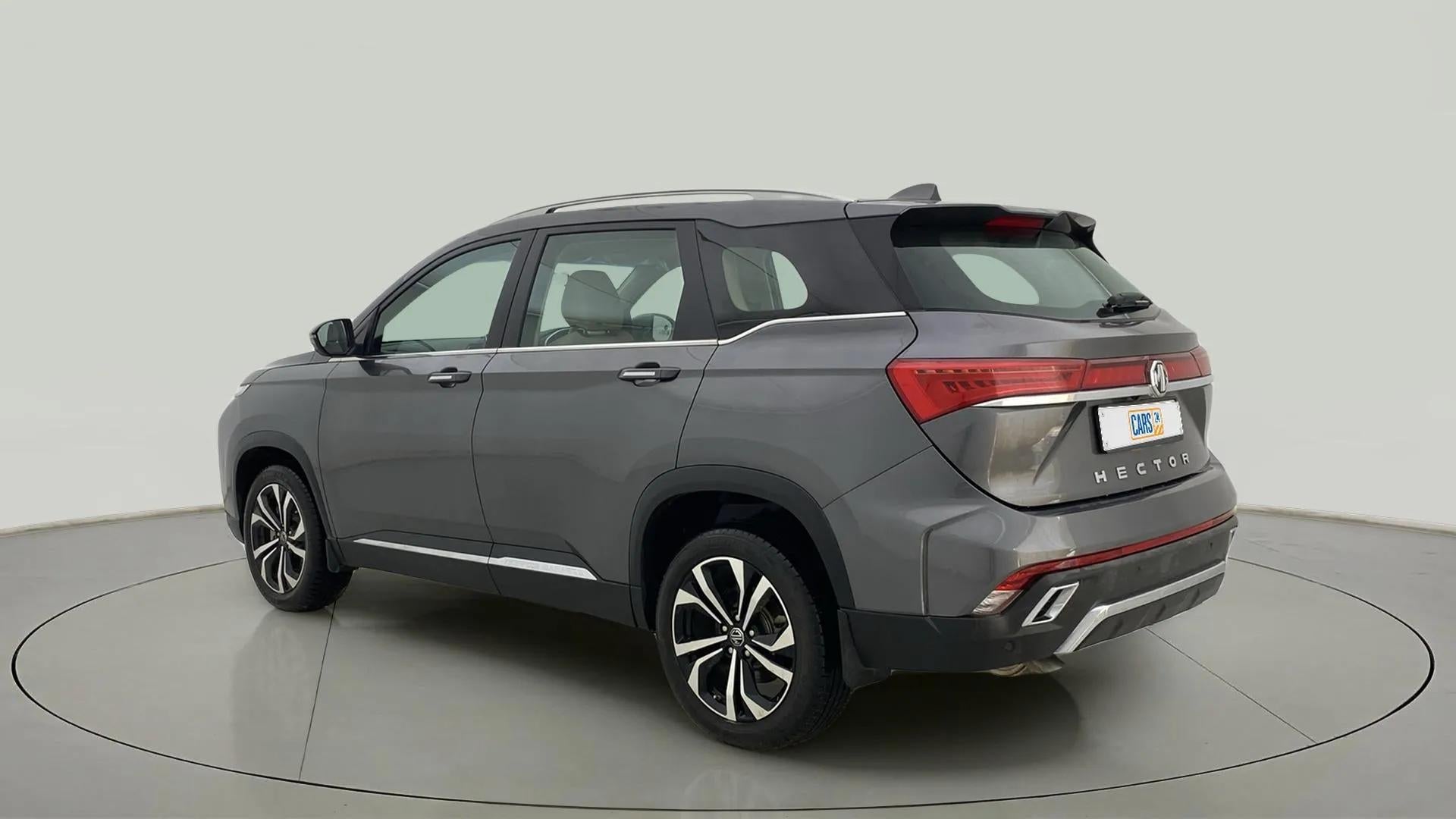 Rear three-quarter of a havana grey MG Hector