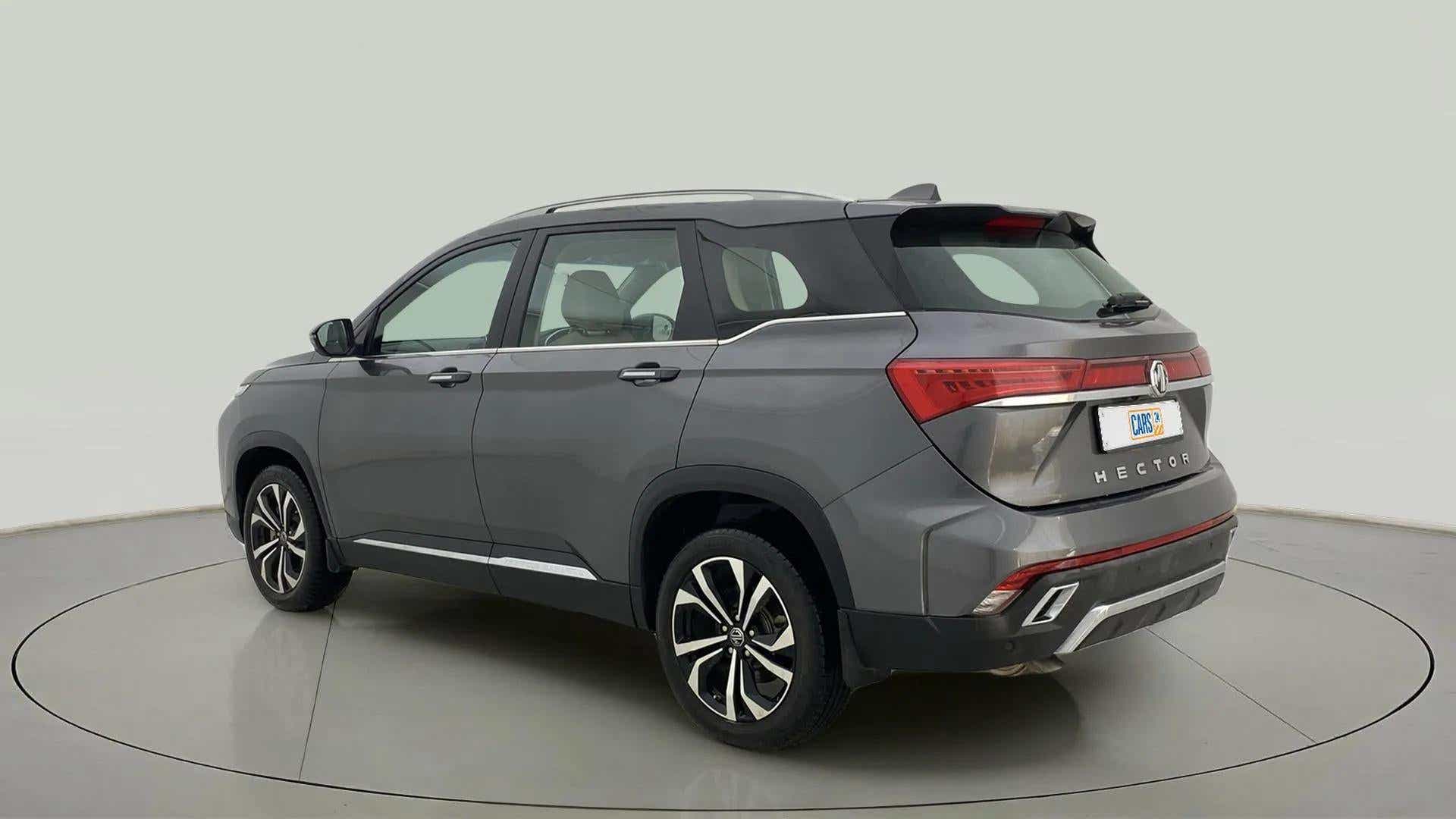 Rear three-quarter of a havana grey MG Hector