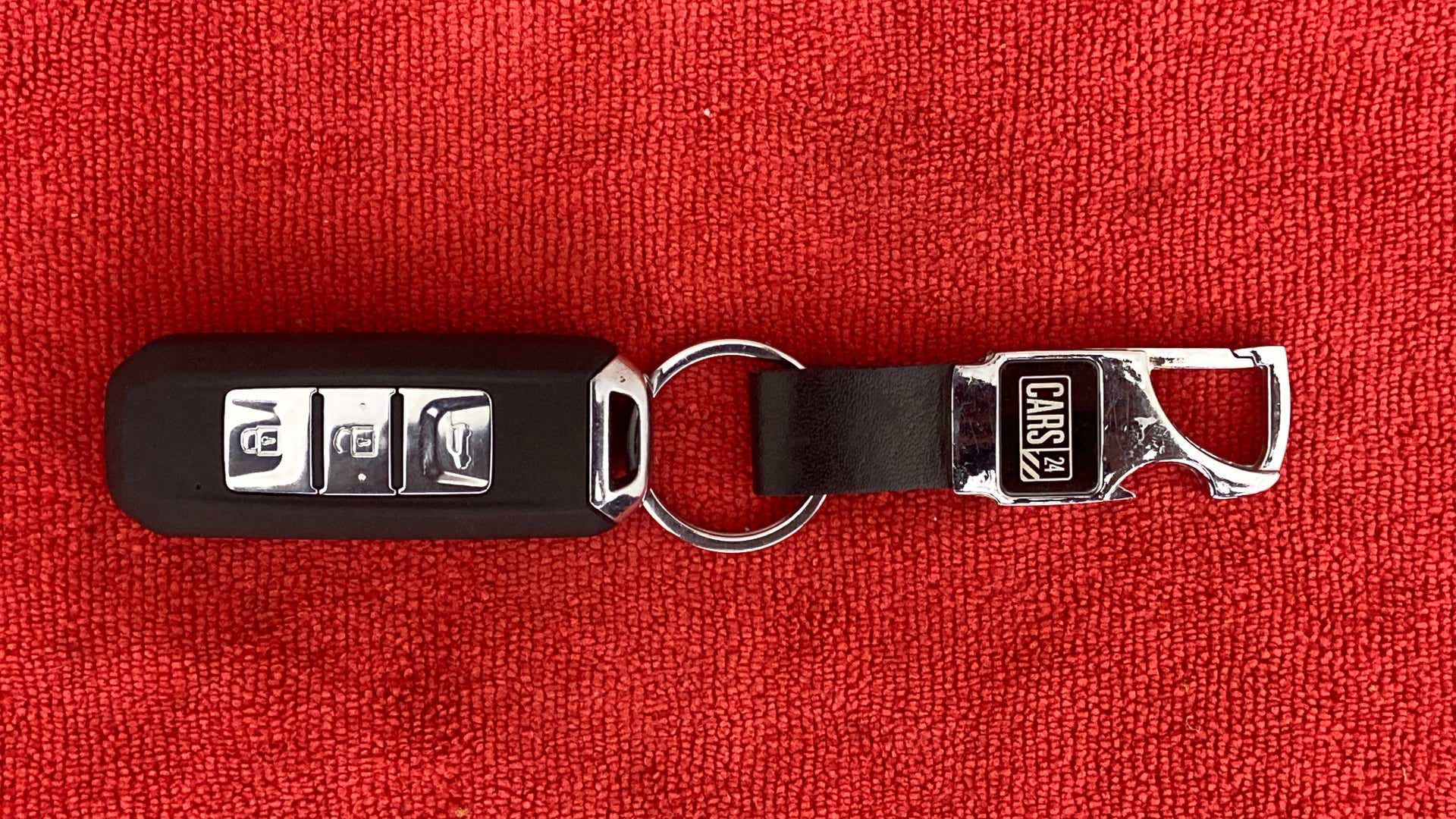 Car key fob with buttons on a keychain for an MG Hector