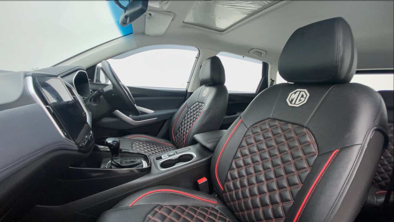 Interior dashboard and front seats of a MG Hector