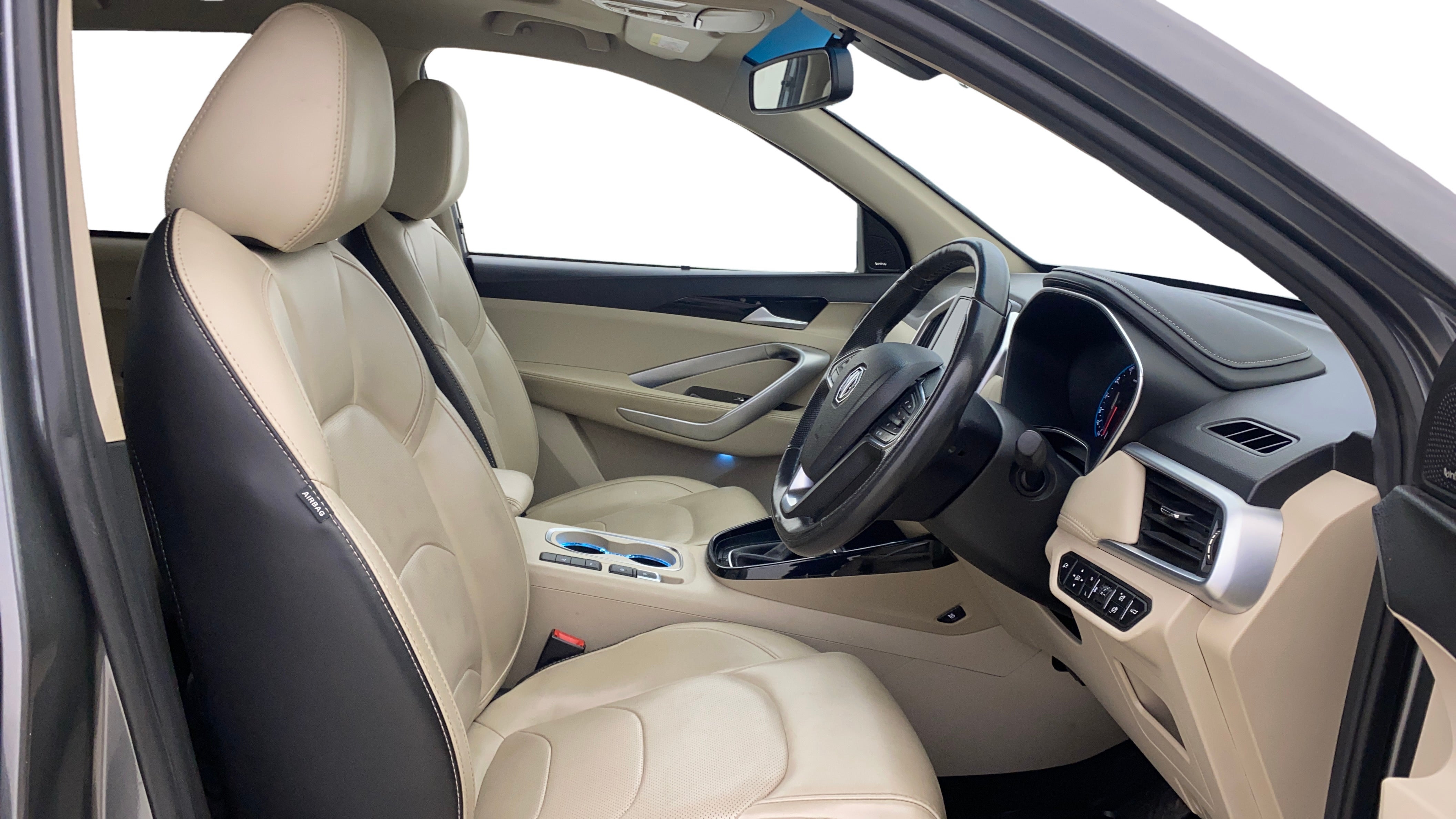 Interior front seats and dashboard of a MG Hector