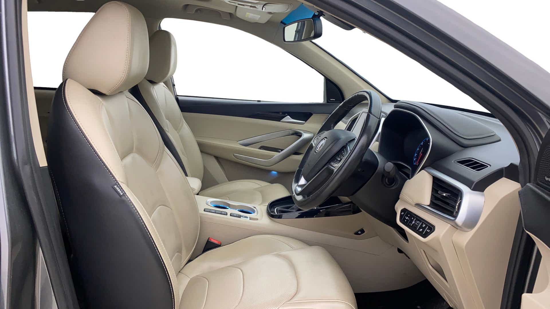 Interior front seats and dashboard of a MG Hector