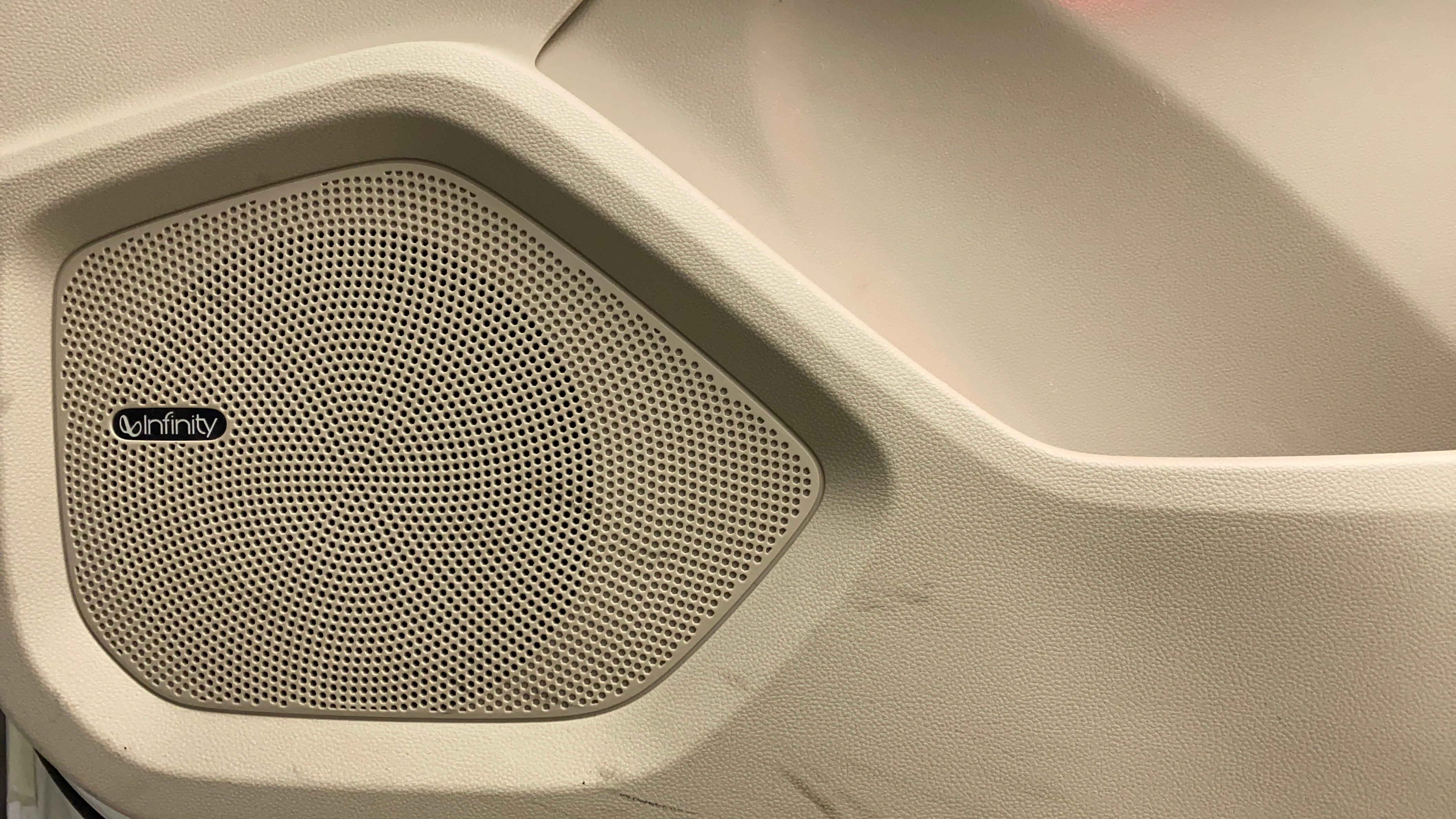 Close-up of an interior speaker on a MG Hector